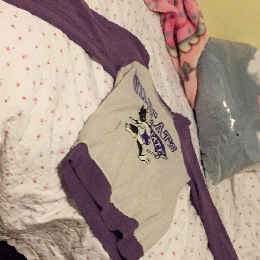 Wildcats purple, white, and black Jacket.